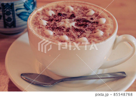 A delicious cup of cafe mocha or mocaccino to warm the cold winter morning A delicious cup of cafe mocha or mocaccino to warm the cold winter morning 85548768