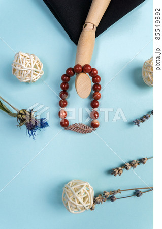 Gemstone jasper bracelet decoration. Accessory hand decoration. Handmade jewellery. Vertical photo Gemstone jasper bracelet decoration. Accessory hand decoration. Handmade jewellery. Vertical photo 85549392