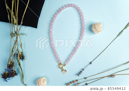 Genuine Natural Pink Quartz Untreated Natural Real Gemstone Beads close up. Flat lay Genuine Natural Pink Quartz Untreated Natural Real Gemstone Beads close up. Flat lay 85549412
