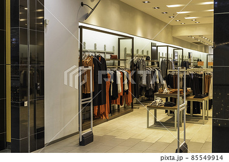 fashionable interior of a clothing store in a modern mall fashionable interior of a clothing store in a modern mall 85549914