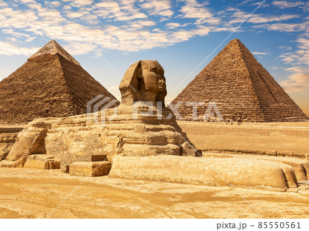 The Great Sphinx between the Khafre and Menkaure Pyramids of Giza, Cairo, Egypt The Great Sphinx between the Khafre and Menkaure Pyramids of Giza, Cairo, Egypt 85550561