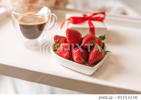 Breakfast for Valentine's Day with coffee and strawberries. Breakfast for Valentine's Day with coffee and strawberries. 85553236