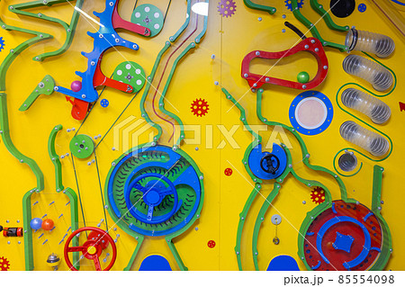 Close up bright Busy board for For children. children's educational toys. Wooden game board. DIY busyboard. Selective focus. 85554098
