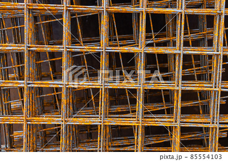 A pile of welded wire mesh rusty. A pile of welded wire mesh rusty. 85554103