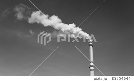 Industrial chimney smoking on sunny winter day Industrial chimney smoking on sunny winter day 85554644