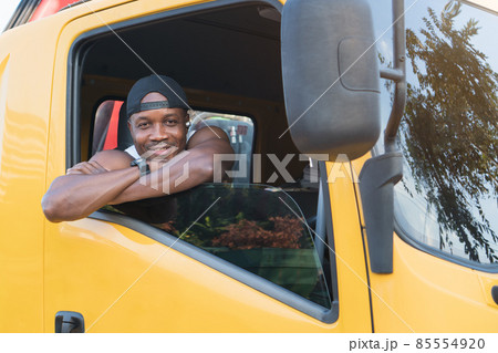 truck driver man smiling confident in insurance cargo transport truck driver man smiling confident in insurance cargo transport 85554920