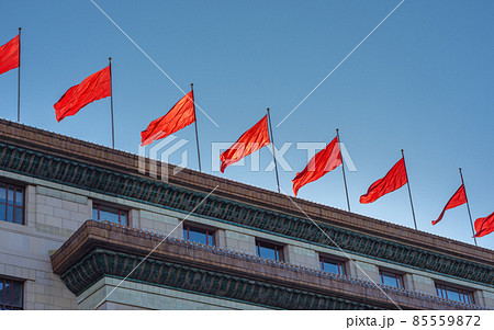 Red banners atop the National People`s Congress in Beijing, China 85559872