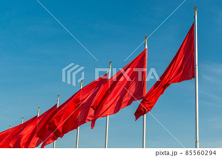 Red banners unfurled in the wind at Tiananmen square in Beijing, China Red banners unfurled in the wind at Tiananmen square in Beijing, China 85560294