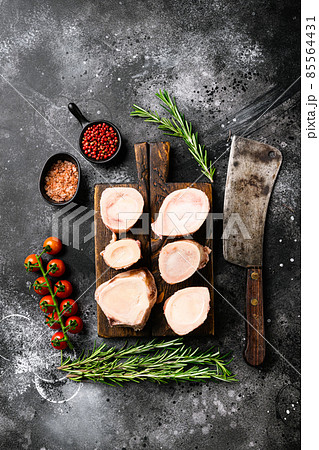 Raw beef marrow bones, on black dark stone table background, top view flat lay 85564431