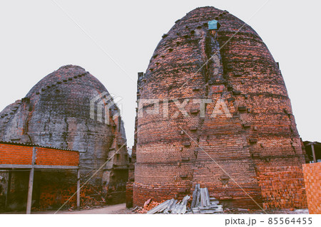 The famous centenarian traditional kilns for manufacturing handmade bricks in Vinh Long Province of Mekong Delta, Vietnam The famous centenarian traditional kilns for manufacturing handmade bricks in Vinh Long Province of Mekong Delta, Vietnam 85564455