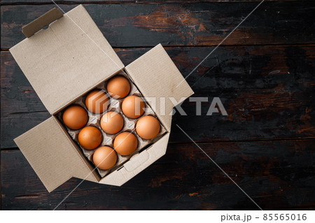 , on old dark wooden table background, top view flat lay , with space for text copyspace 85565016