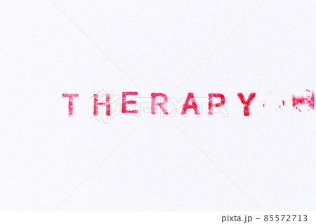 Red color ink rubber stamp in word therapy on white paper background 85572713
