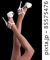 Beautiful legs of an young woman, in fishnet stockings 85575476