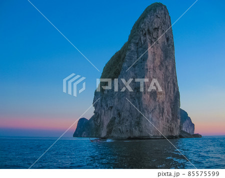 Small boats at the Andaman Sea in sunset Small boats at the Andaman Sea in sunset 85575599