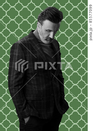 Black and white portrait of a stylish elegant senior businessman with a beard and casual business clothes against retro colorful pattern design background gesturing with hands Black and white portrait of a stylish elegant senior businessman with a beard and casual business clothes against retro colorful pattern design background gesturing with hands 85577099