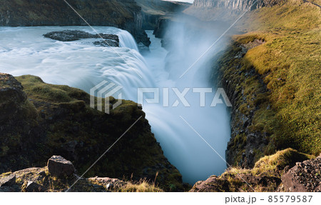 Spectacular Gullfoss Golden falls waterfall long exposure to the canyon Spectacular Gullfoss Golden falls waterfall long exposure to the canyon 85579587