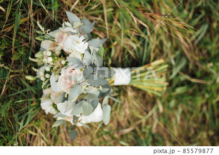 beautiful wedding bouquet on the grass. Wedding day 85579877
