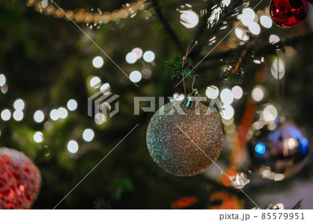 Golden snowflake decoration on Christmas tree Golden snowflake decoration on Christmas tree 85579951