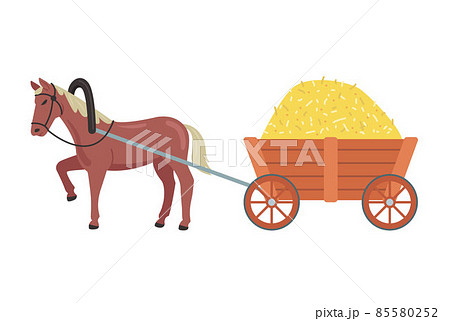a horse carries a cart with hay. transportation of goods in the village. 85580252