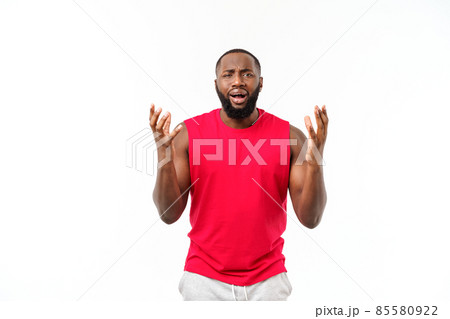 Young sport african american man pleading isolate over grey background. 85580922