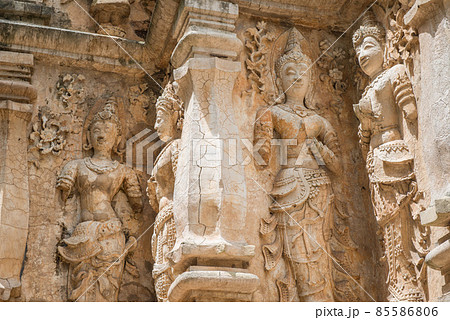 The ancient stucco figures decorated outside the wall of Viharn in Wat Jed Yod of Chiang Mai province of Thailand. This stucco reliefs is the most beautiful figures in traditional Lanna style. The ancient stucco figures decorated outside the wall of Viharn in Wat Jed Yod of Chiang Mai province of Thailand. This stucco reliefs is the most beautiful figures in traditional Lanna style. 85586806
