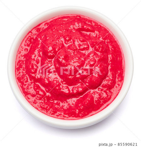 Horseradish red sauce in ceramic bowl isolated on white Horseradish red sauce in ceramic bowl isolated on white 85590621