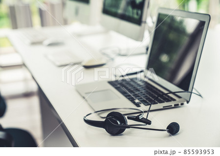 Headset and customer support equipment at call center ready for actively service Headset and customer support equipment at call center ready for actively service 85593953