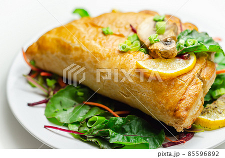 Steak and ale pasty, British steak with ale, potato and leek, wrapped in puff pastry Steak and ale pasty, British steak with ale, potato and leek, wrapped in puff pastry 85596892