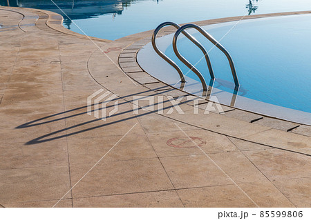 Railings of an outdoor swimming pool Railings of an outdoor swimming pool 85599806