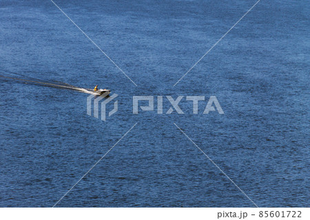 Boat with fishermen at the river Dnieper, Ukraine 85601722