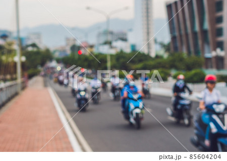 Blurred picture of motorcycles on the road 85604204