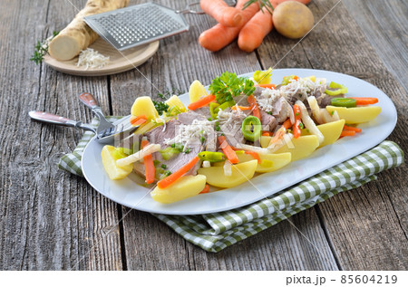 Pork with root vegetables Pork with root vegetables 85604219