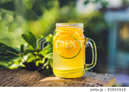 Homemade Fermented Raw Kombucha Tea Ready to Drink With orange and lime. Summer Homemade Fermented Raw Kombucha Tea Ready to Drink With orange and lime. Summer 85605028
