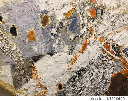 Textured background of multi-layer flaking paint on the wall. Mixing different colors of paints in the cleaved layers on the surface. Grunge texture with a deep pattern 85606606