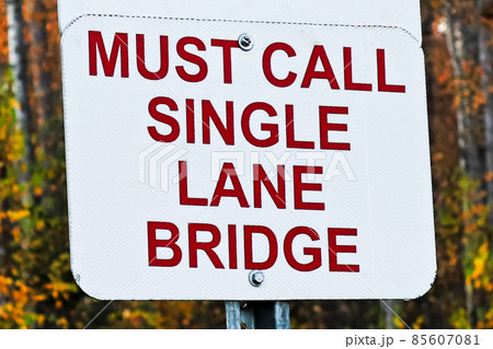 A Must Call, Single Lane Bridge sign 85607081