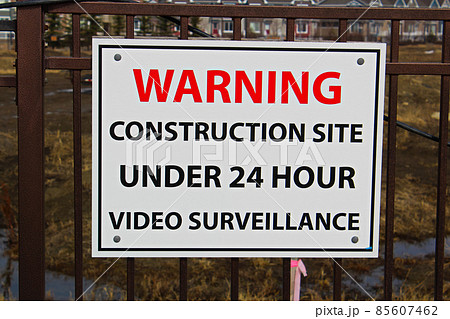 Close up of a construction site surveillance sign 85607462