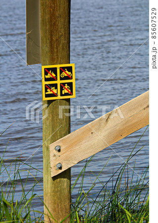 No off-road vehicle sign posted near water 85607529