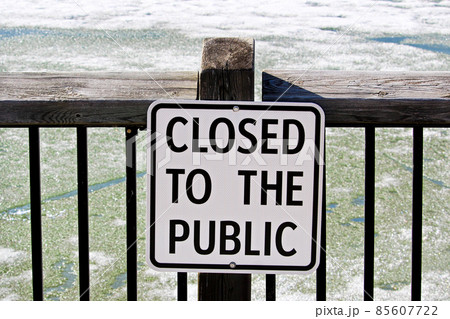 Closed to the public sign posted on a water boardwalk 85607722