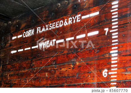 Height indicators for various grains in an old grain car 85607770