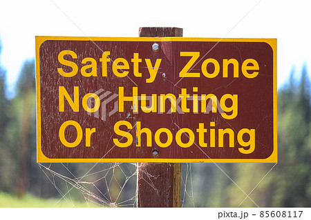 A Safety Zone, No Hunting or Shooting sign 85608117