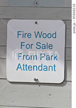 A fire wood for sale from park attendant sign 85608216