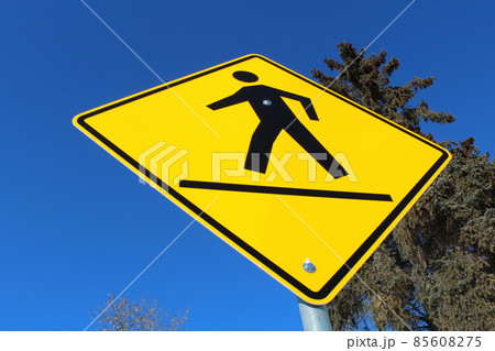 Crosswalk on a Yellow Diamond Sign Crosswalk on a Yellow Diamond Sign 85608275