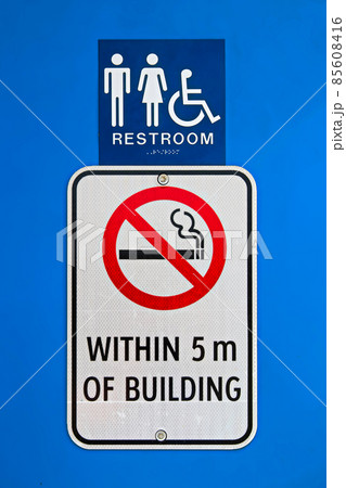 A no smoking within 5m of building sign at a reststop washroom A no smoking within 5m of building sign at a reststop washroom 85608416
