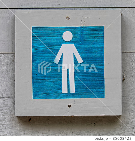 A wooden blue male bathroom sign A wooden blue male bathroom sign 85608422