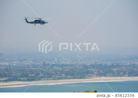 Sunny view of a Military Helicopter over downtown from Cabrillo National Monument Sunny view of a Military Helicopter over downtown from Cabrillo National Monument 85612556