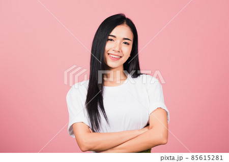 young woman standing her smile confidence with crossed arms young woman standing her smile confidence with crossed arms 85615281