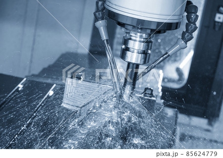 The CNC milling machine cutting the mold parts with oil coolant method. The CNC milling machine cutting the mold parts with oil coolant method. 85624779