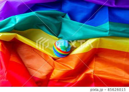 LGBTQ flag and symbol on table top view LGBTQ flag and symbol on table top view 85626015
