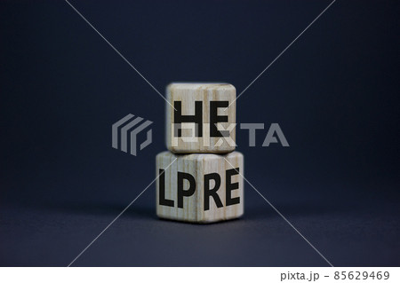 Help is here and support symbol. Turned cubes and changed the word help to here. Beautiful grey table, grey background, copy space. Business, motivational, support and help is here concept. Help is here and support symbol. Turned cubes and changed the word help to here. Beautiful grey table, grey background, copy space. Business, motivational, support and help is here concept. 85629469