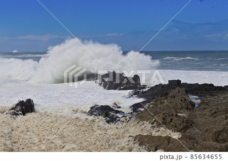 Big wave hits rocks on coast 85634655